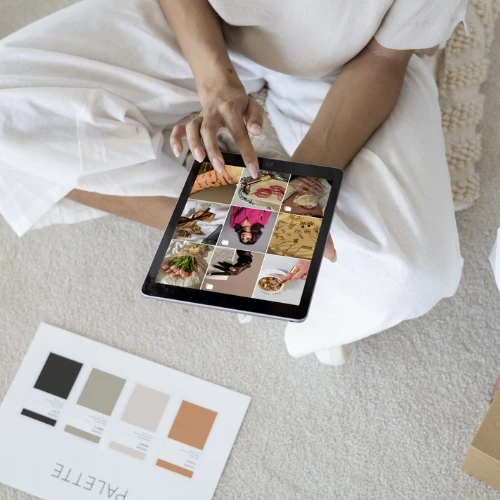 Marketing experts analyzing performance metrics on laptop